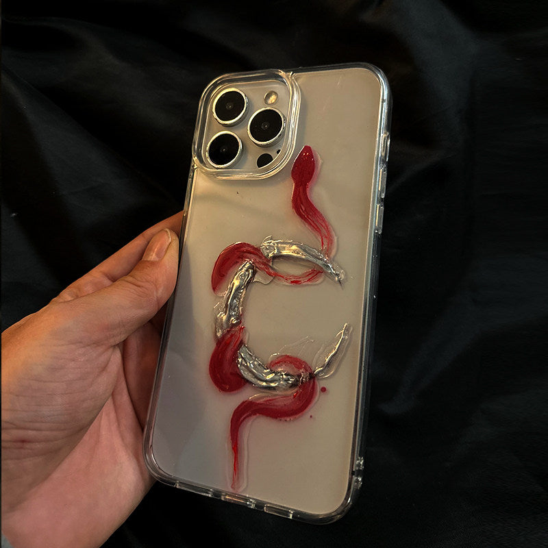 A clear iPhone case featuring a handmade 3D design of a red snake intertwined with a metallic silver moon.