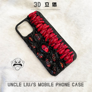 Handmade 3D horror-themed iPhone case featuring multiple realistic eyes and red textured details on a black background.
