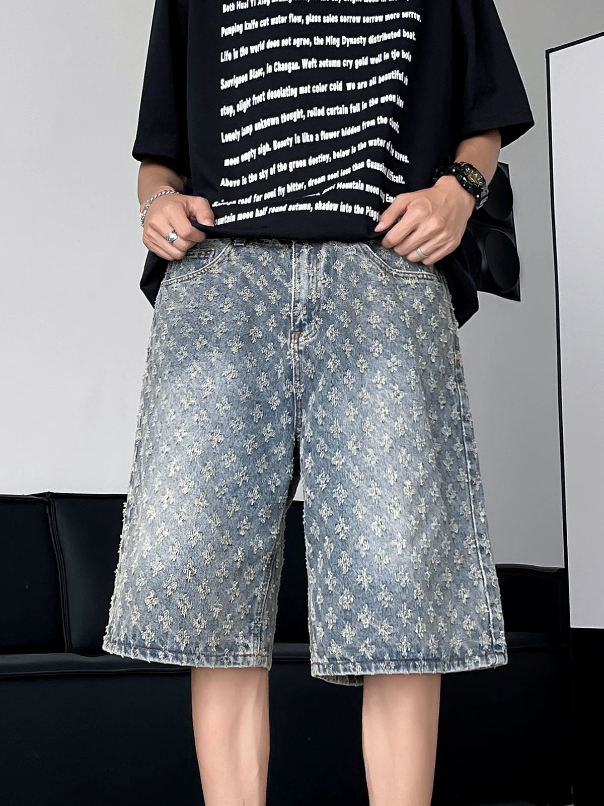 Distressed Wash Denim Shorts with Embroidered Floral Pattern