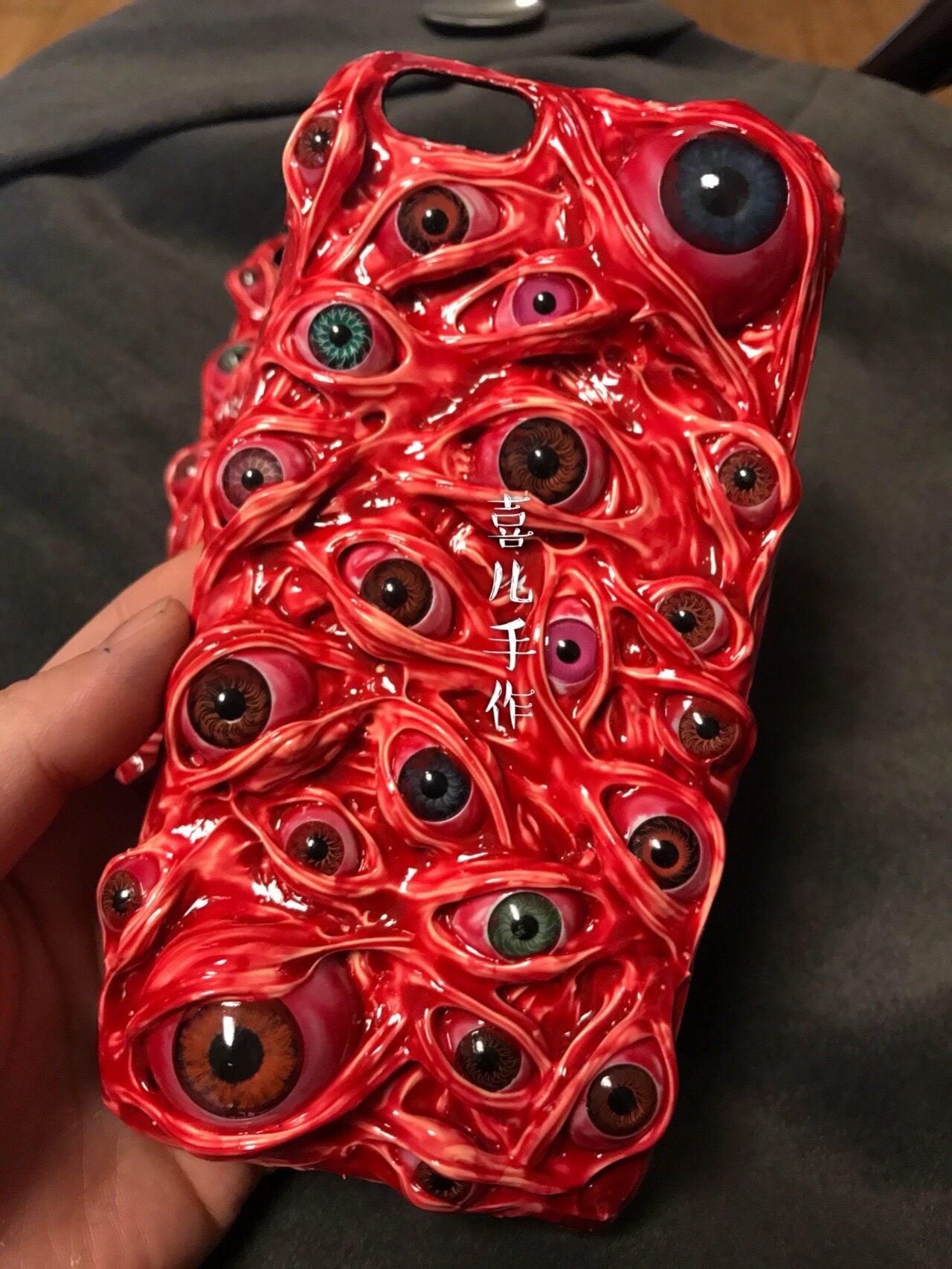 Handmade 3D red phone case covered in realistic creepy eyeballs for iPhone
