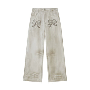 Comfortable Bow Appliqué Distressed Jeans