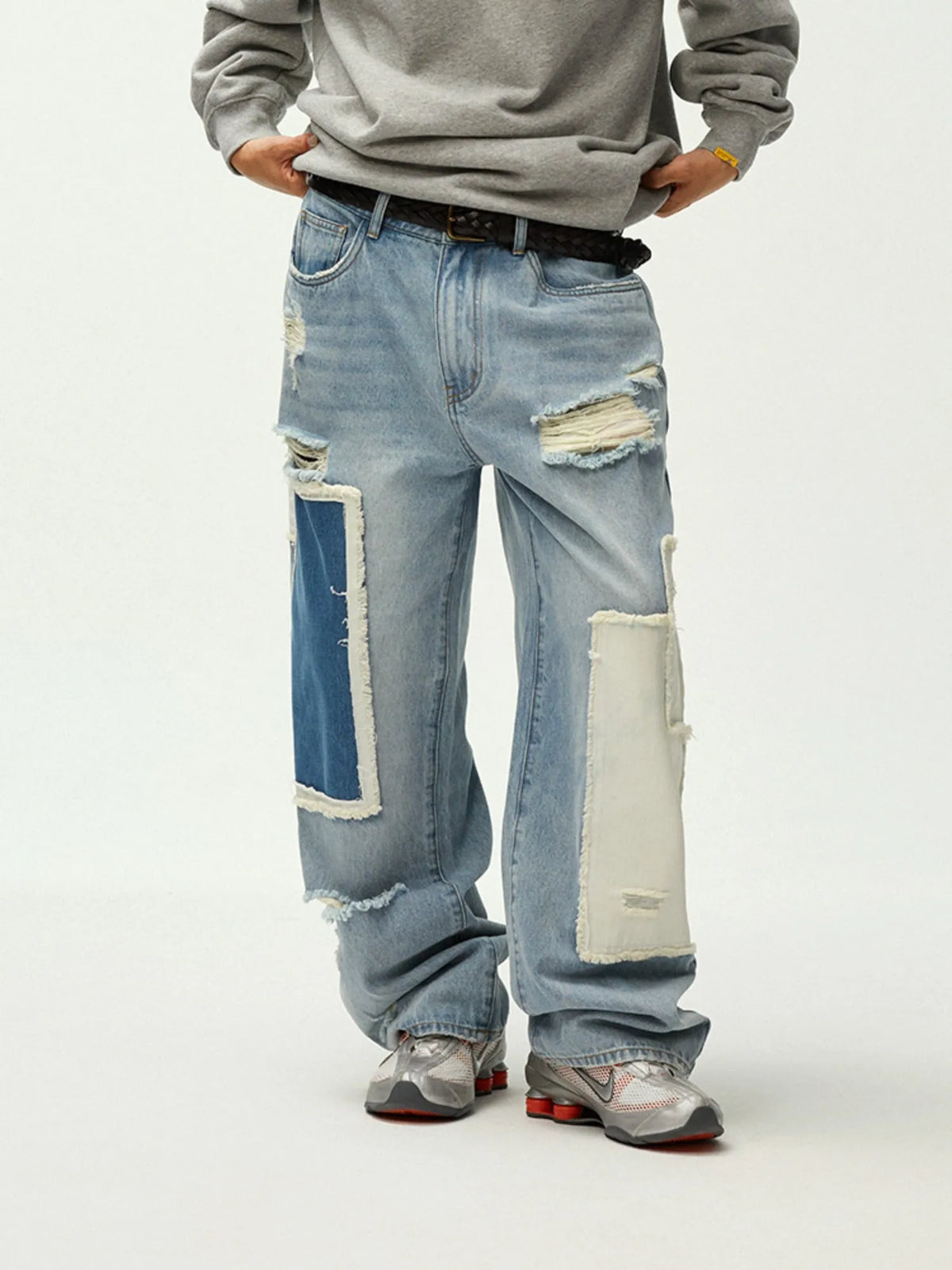 Asymmetric Patchwork Distressed Straight-Leg Jeans