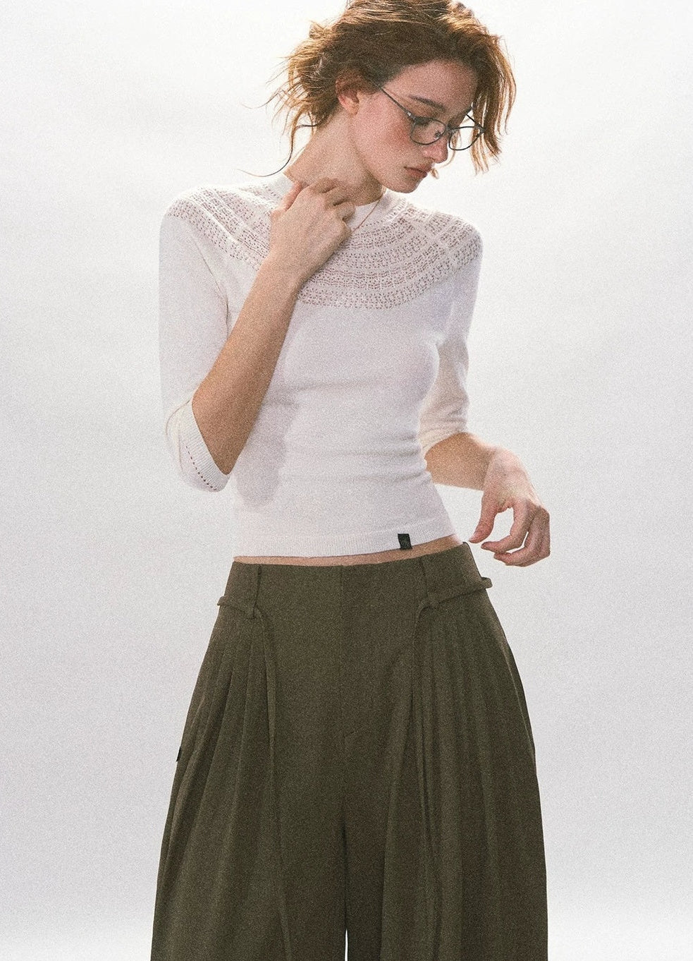 Fan-Shaped Hollow-Out Knit Top