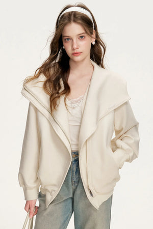 A light apricot hooded double-zip jacket.