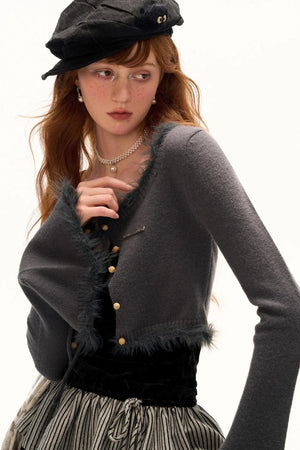A stylish gray wool sweater with a scoop neck, perfect for a cozy autumn look.