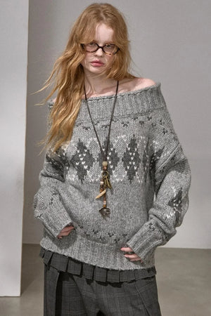 A thick knit argyle sweater with an off-shoulder neckline, available in gray and red.