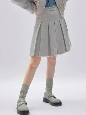 A vintage-style pleated skirt with lace trim.