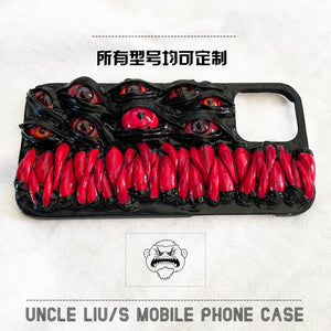 Handmade 3D horror-themed iPhone case featuring multiple realistic eyes and red textured details on a black background.