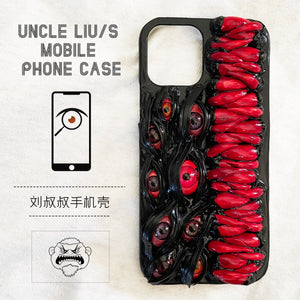 Handmade 3D horror-themed iPhone case featuring multiple realistic eyes and red textured details on a black background.