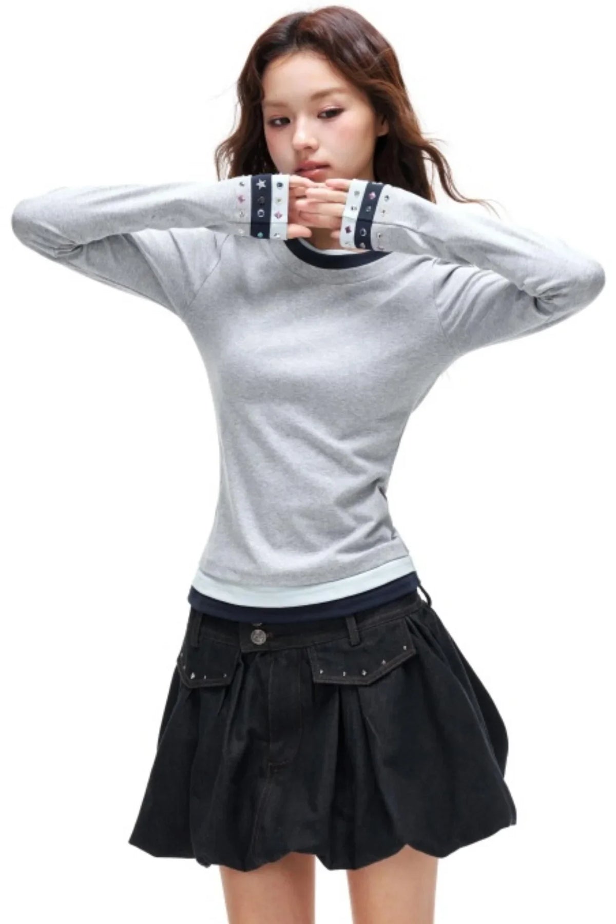 A gray long-sleeve top with rhinestone-embellished cuffs.