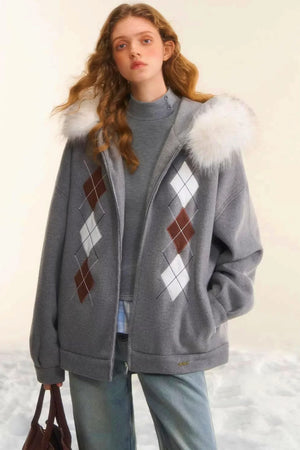A gray wool jacket with diamond embroidery and a faux fur hood.