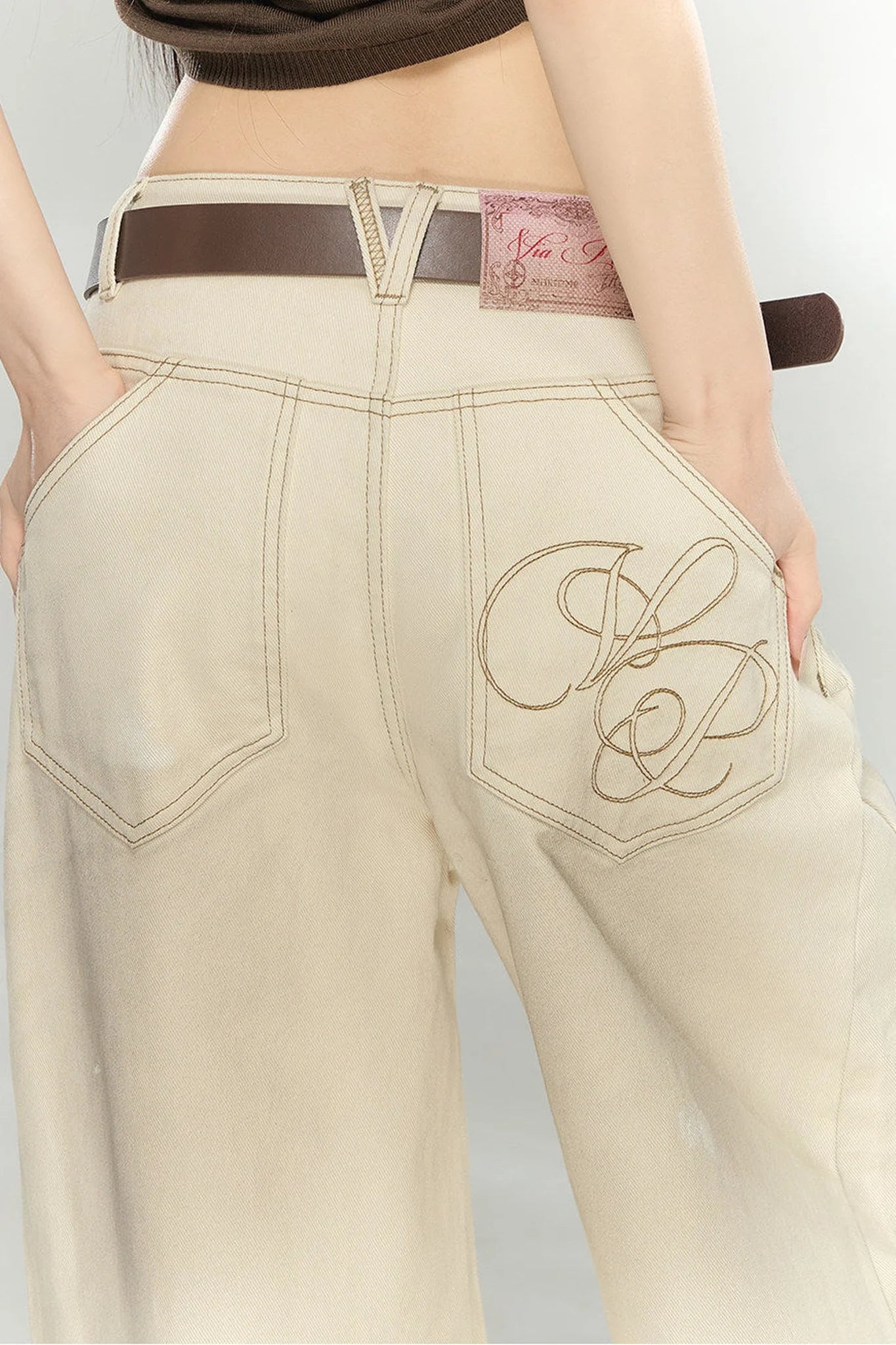 Distressed Bow-Tie Strap Jeans