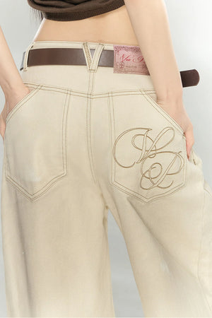 Distressed Bow-Tie Strap Jeans