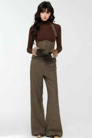 A model wearing an elegant woolen tweed vest and matching pants set.