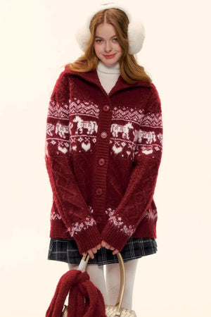 A woman wearing a red Fair Isle knit cardigan with a white pattern.