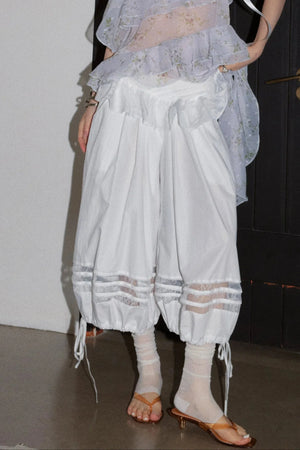 Floral Ruffle Top And White Balloon Pants