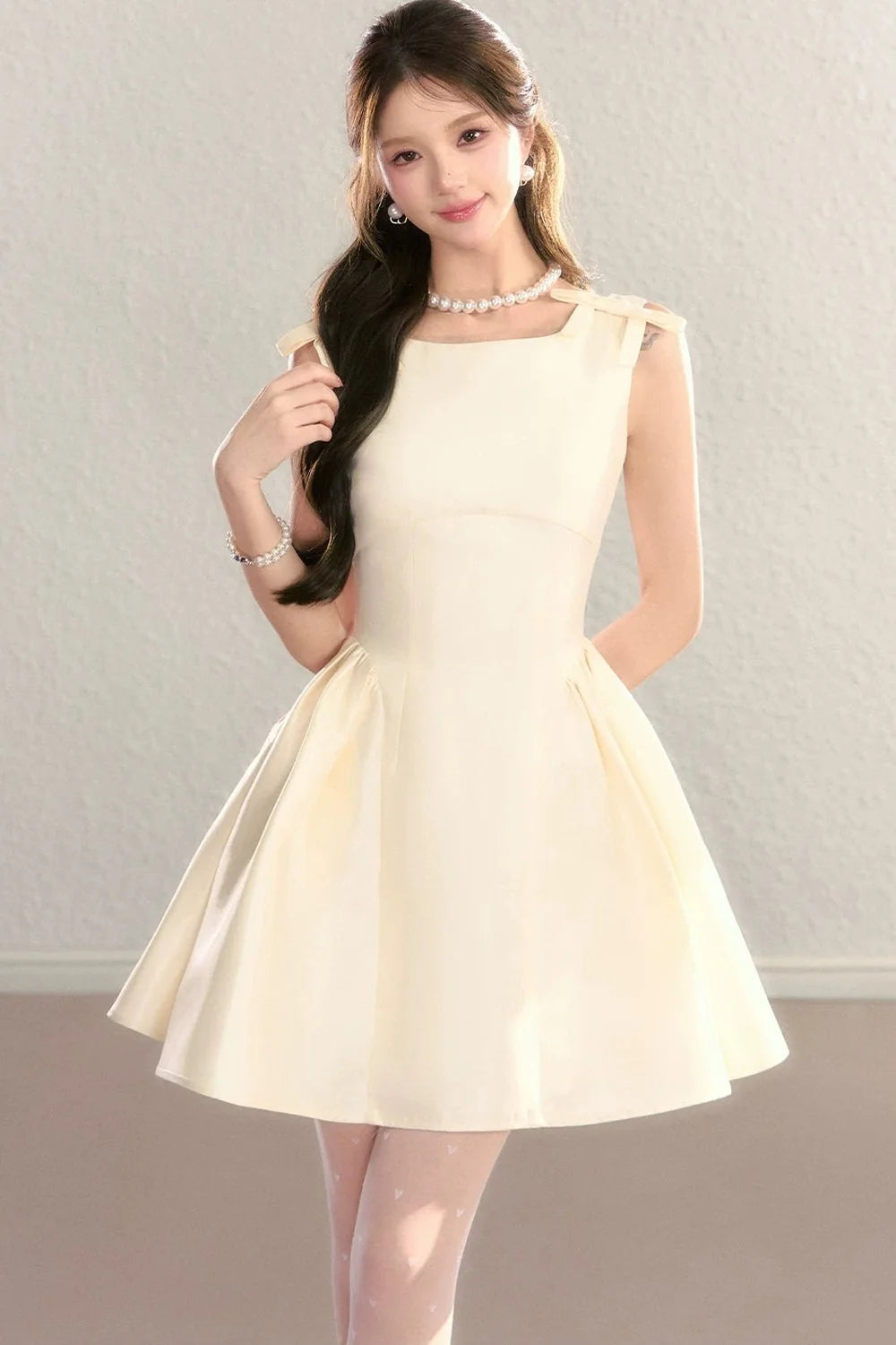 French Sleeveless Cinched Dress