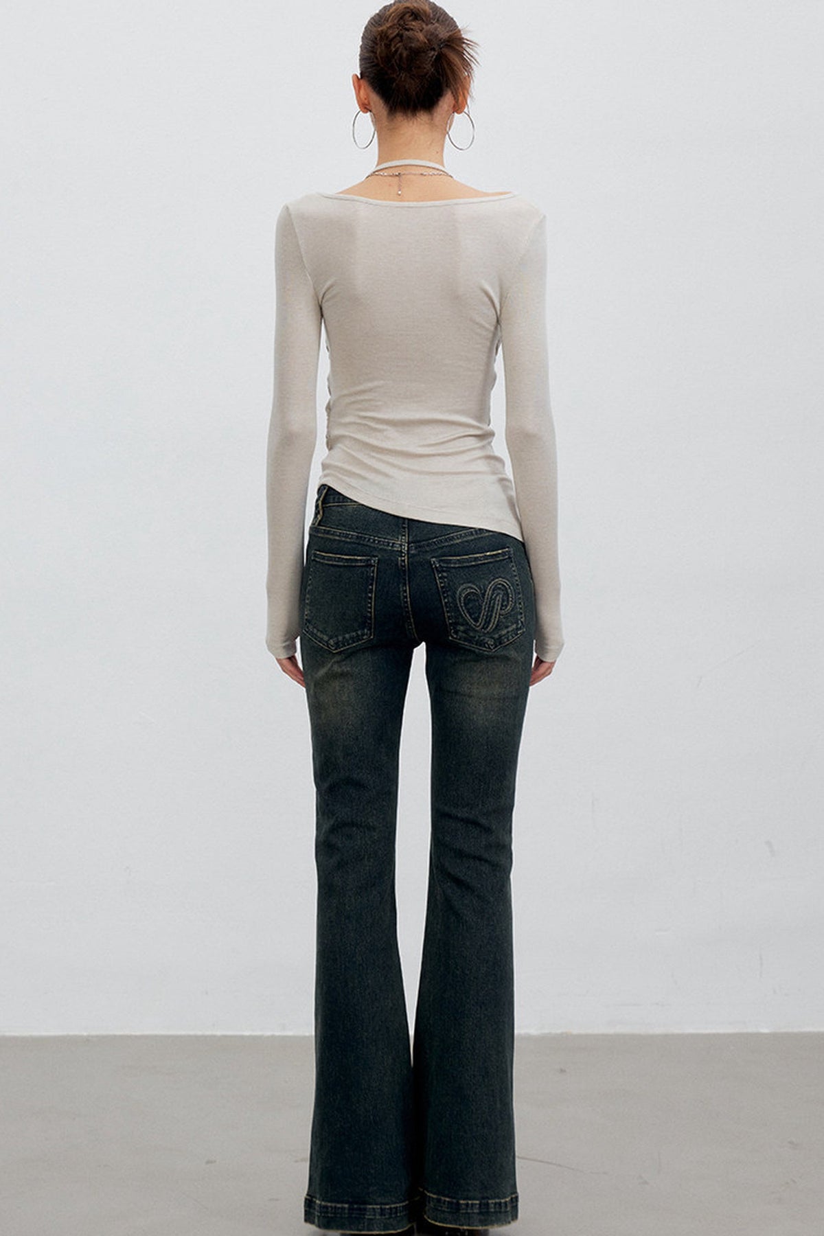 Heart Button Slit Flared Jeans