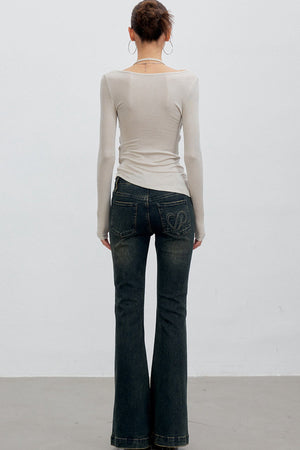 Heart Button Slit Flared Jeans