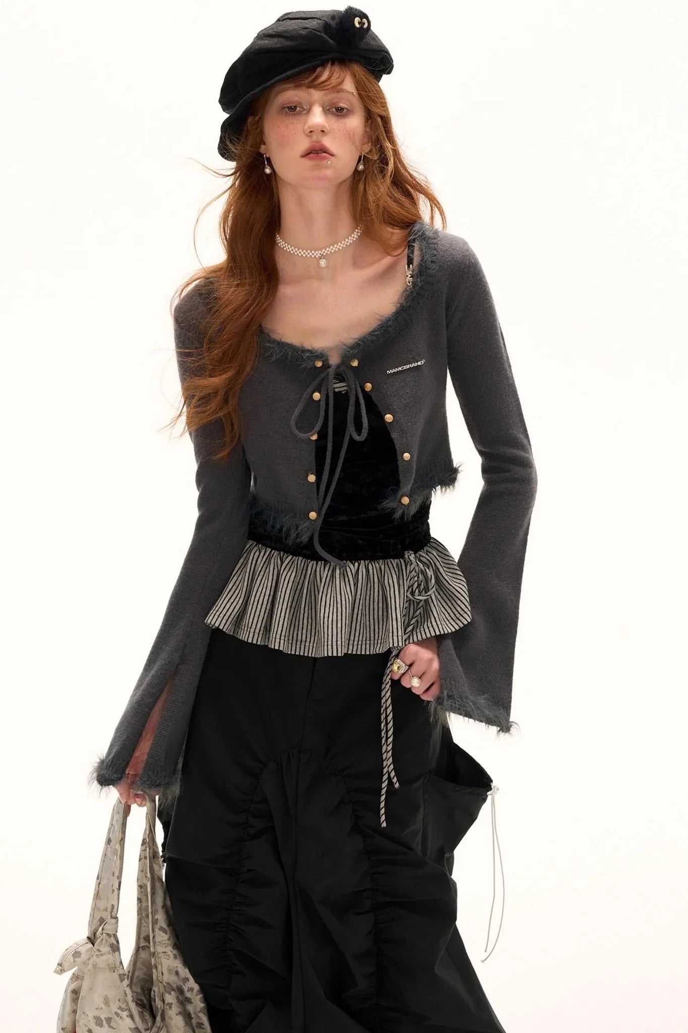 A stylish gray wool sweater with a scoop neck, perfect for a cozy autumn look.