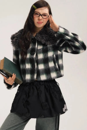 A gray and green plaid wool jacket with a dark faux-fur collar.