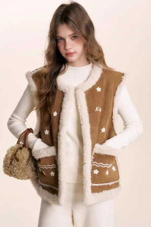 Cappuccino shearling lamb wool vest with floral embroidery.
