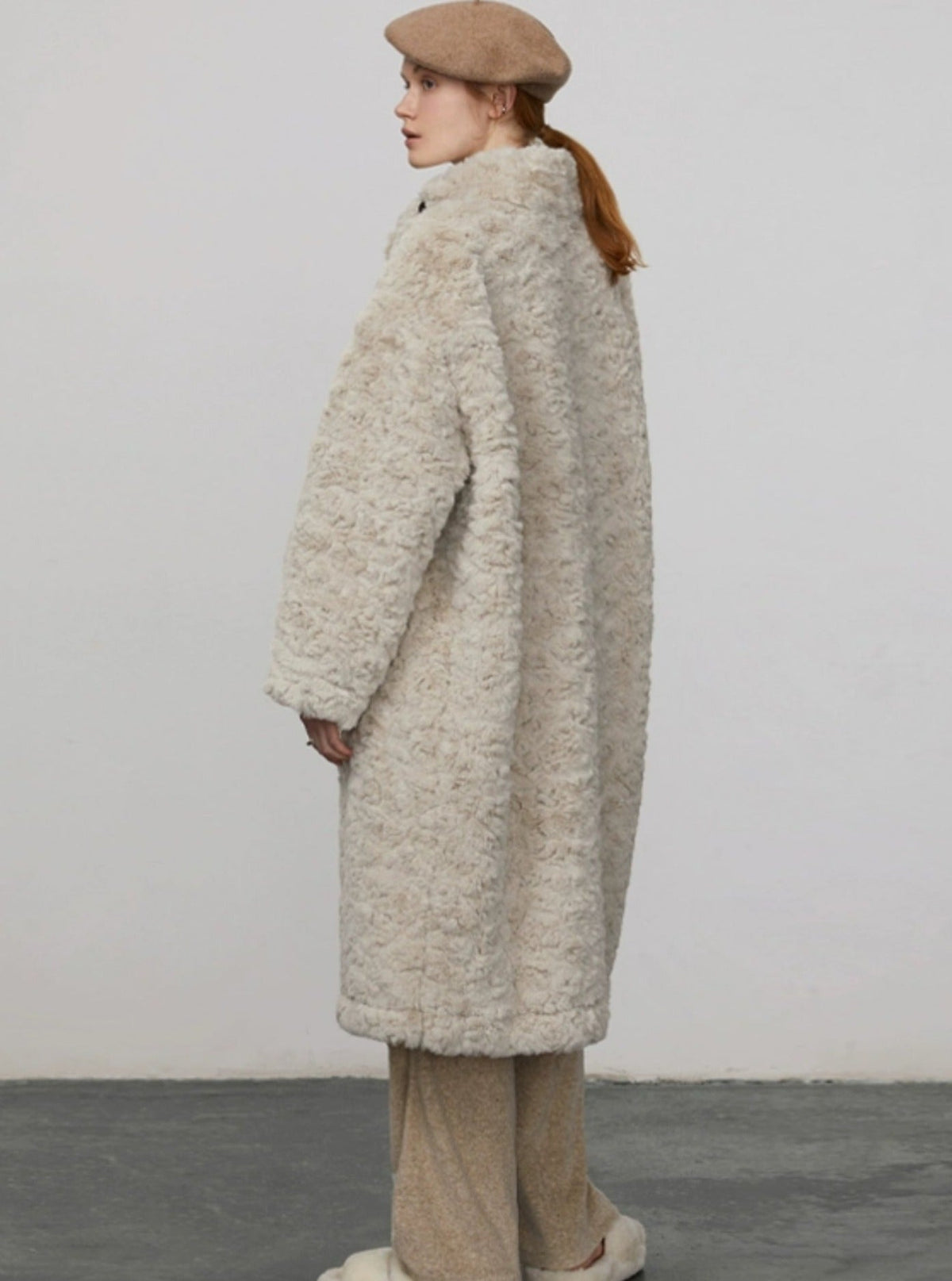 Thick mid length fur integrated coat