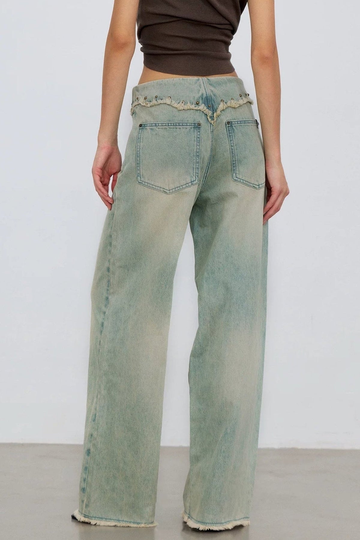 V-Shaped Raw Edge Rivet Denim Pants