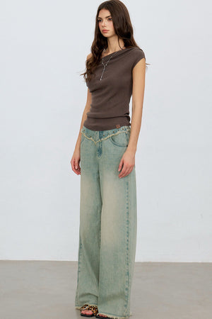 V-Shaped Raw Edge Rivet Denim Pants