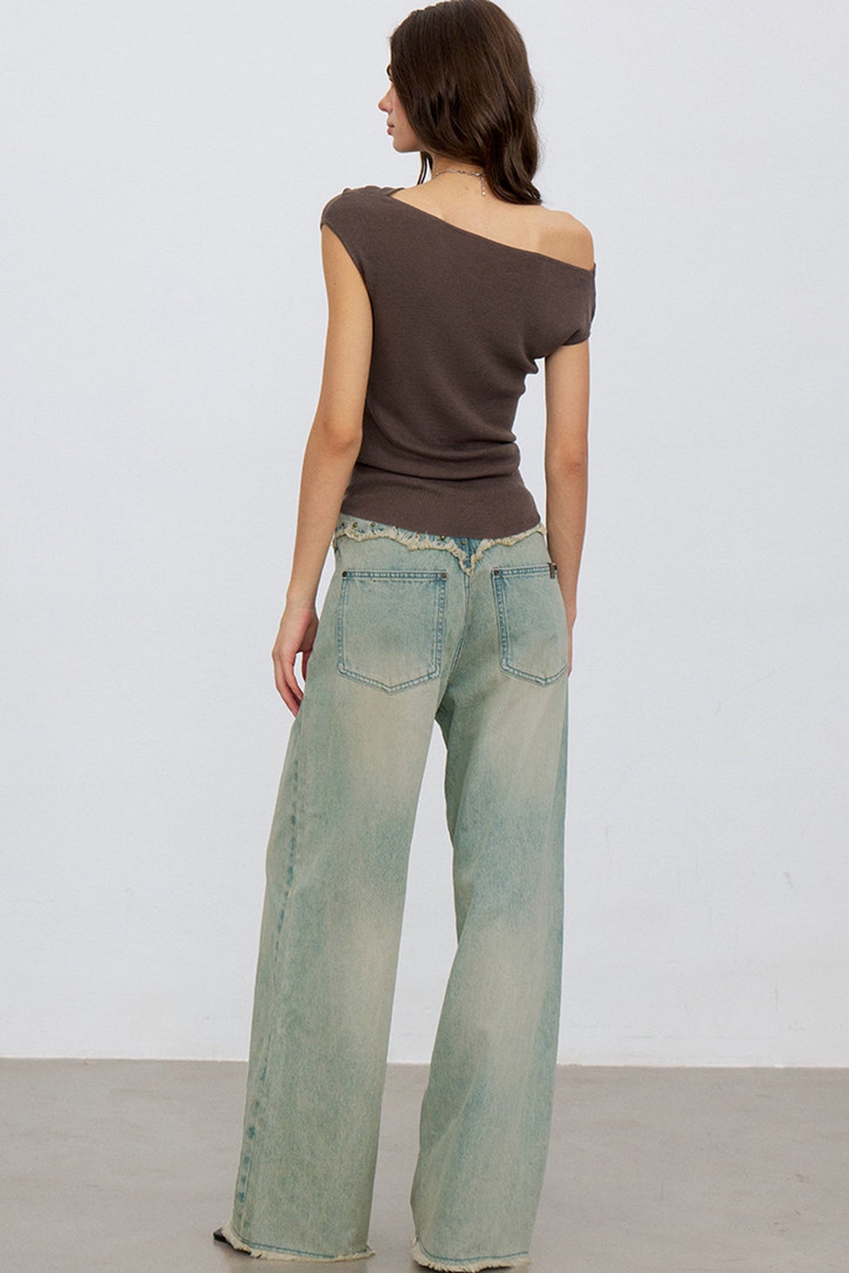V-Shaped Raw Edge Rivet Denim Pants
