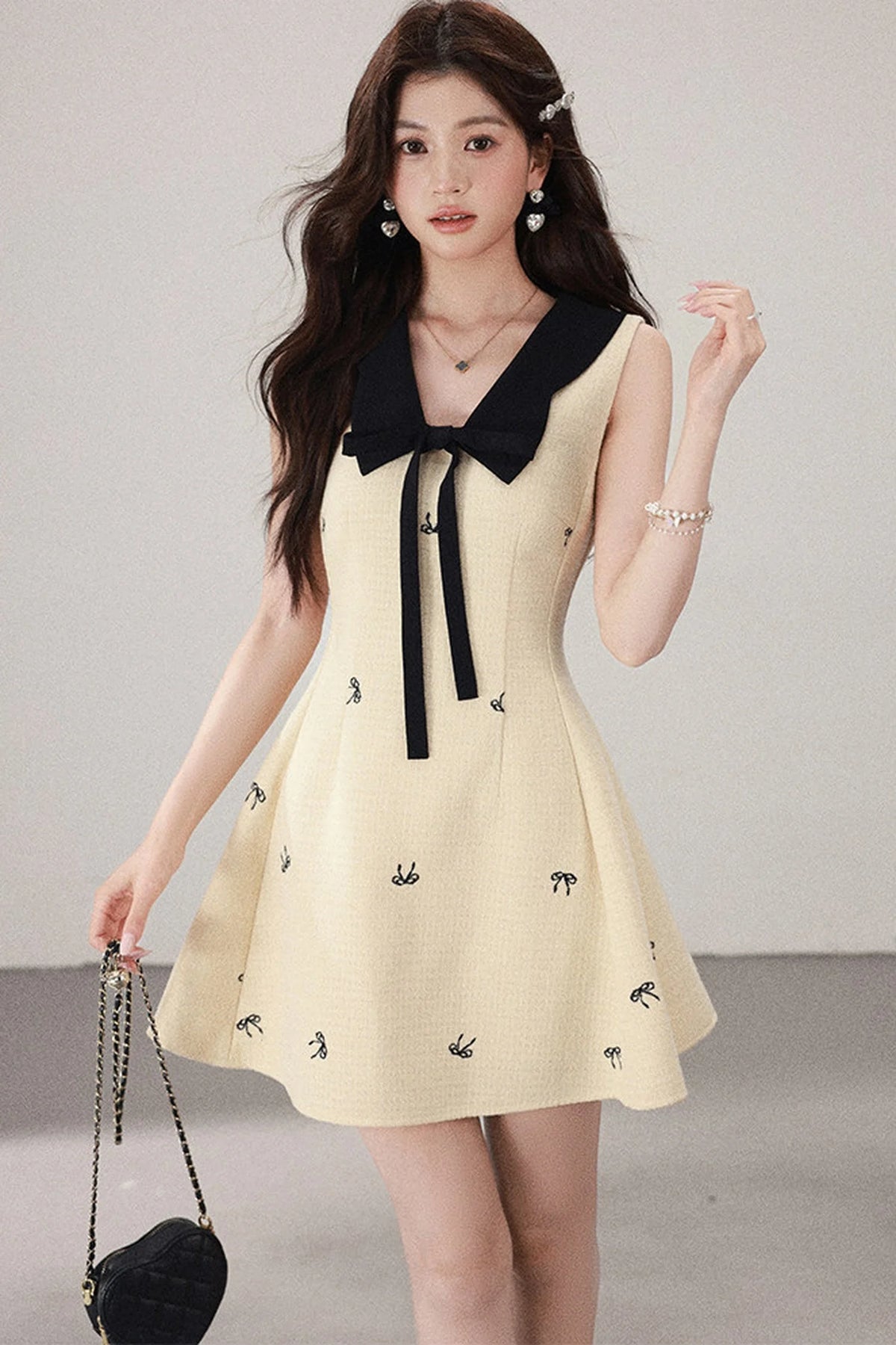 Yellow Sleeveless Bow Collar Dress