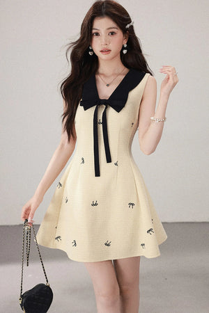 Yellow Sleeveless Bow Collar Dress