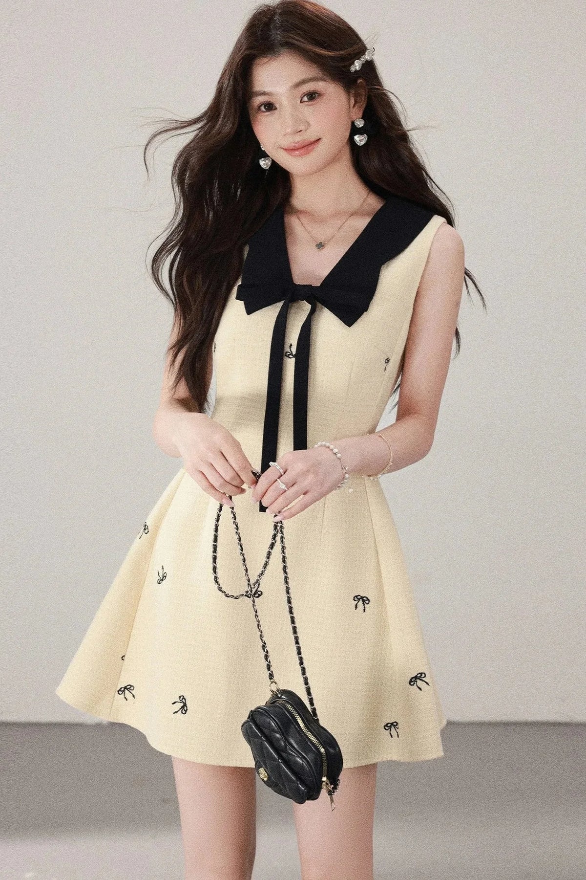 Yellow Sleeveless Bow Collar Dress