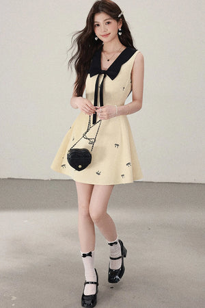 Yellow Sleeveless Bow Collar Dress